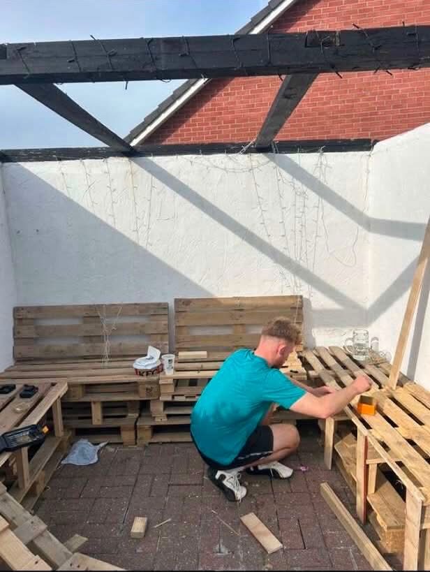 Mid-build: framing and fixing the bench seating in place